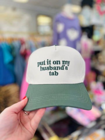 Put It On My Husbands Tab Trucker Hat - Green